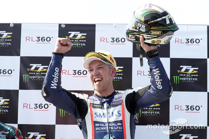 Peter Hickman celebrates winning the RL360º Superstock TT race