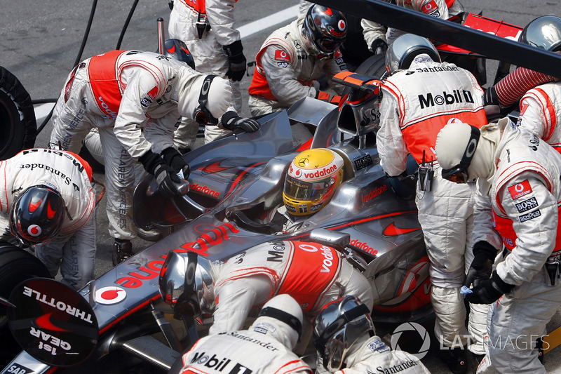 Lewis Hamilton, McLaren MP4-23, makes a stop