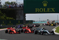 Valtteri Bottas, Mercedes-AMG F1 W09 leads Sebastian Vettel, Ferrari SF71H and Kimi Raikkonen, Ferrari SF71H at the start of the race