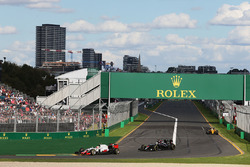 Esteban Gutierrez, Haas F1 Team VF-16 and Fernando Alonso, McLaren MP4-31