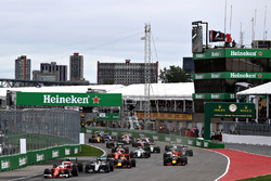 Sebastian Vettel, Ferrari SF16-H leads Nico Rosberg, Mercedes AMG F1 W07, Lewis Hamilton, Mercedes AMG F1 W07, Daniel Ricciardo, Red Bull Racing RB12, Max Verstappen, Red Bull Racing RB12 and the rest of the field at the start