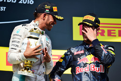 race winner Lewis Hamilton, Mercedes AMG F1 celebrates on the podium with third placed Daniel Ricciardo, Red Bull Racing