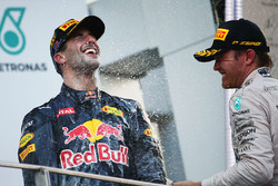 Race winner Daniel Ricciardo, Red Bull Racing celebrates on the podium with third placed Nico Rosber