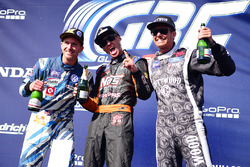 Podium: winner Brian Deegan, Ford, second place Scott Speed, Andretti Autosport, third place Patrik Sandell, Bryan Herta Rallysport