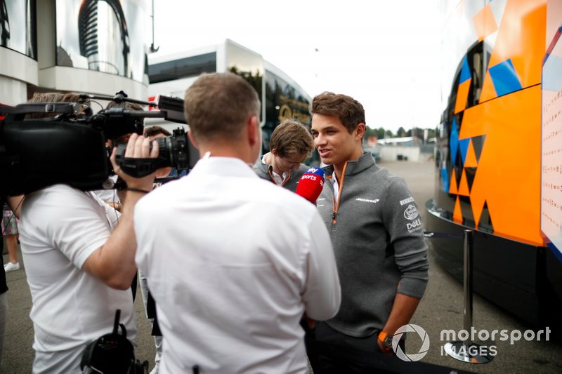 Lando Norris, McLaren, talks to the media
