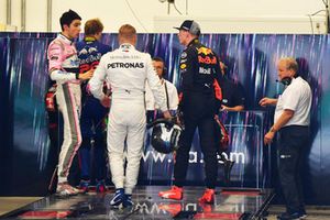 Max Verstappen, Red Bull Racing and Esteban Ocon, Racing Point Force India square up after the race following their on track crash 