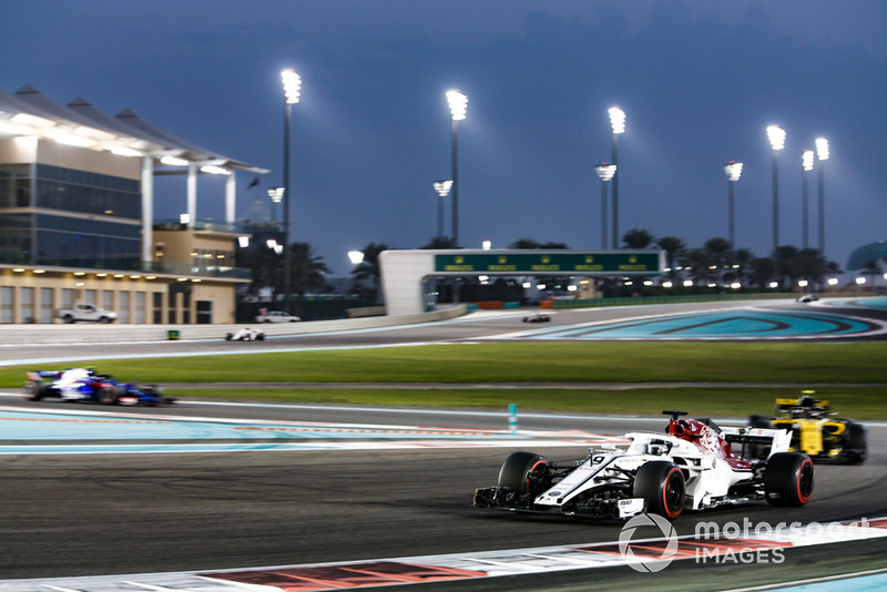 Marcus Ericsson, Sauber C37 leads Carlos Sainz Jr., Renault Sport F1 Team R.S. 18 and Pierre Gasly, Scuderia Toro Rosso STR13