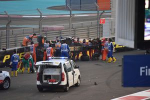 Medics and marshals assist Nico Hulkenberg, Renault Sport F1 Team R.S. 18 who crashed and rolled on lap one 