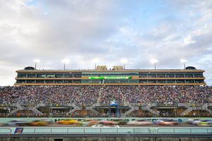 The field races past the start/finish line for a restart