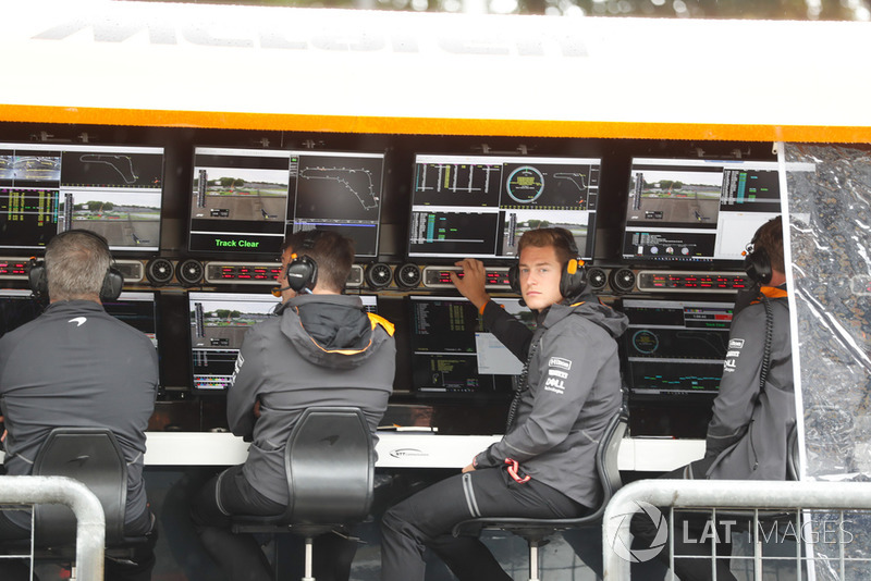 Stoffel Vandoorne, McLaren, watches from the pit wall