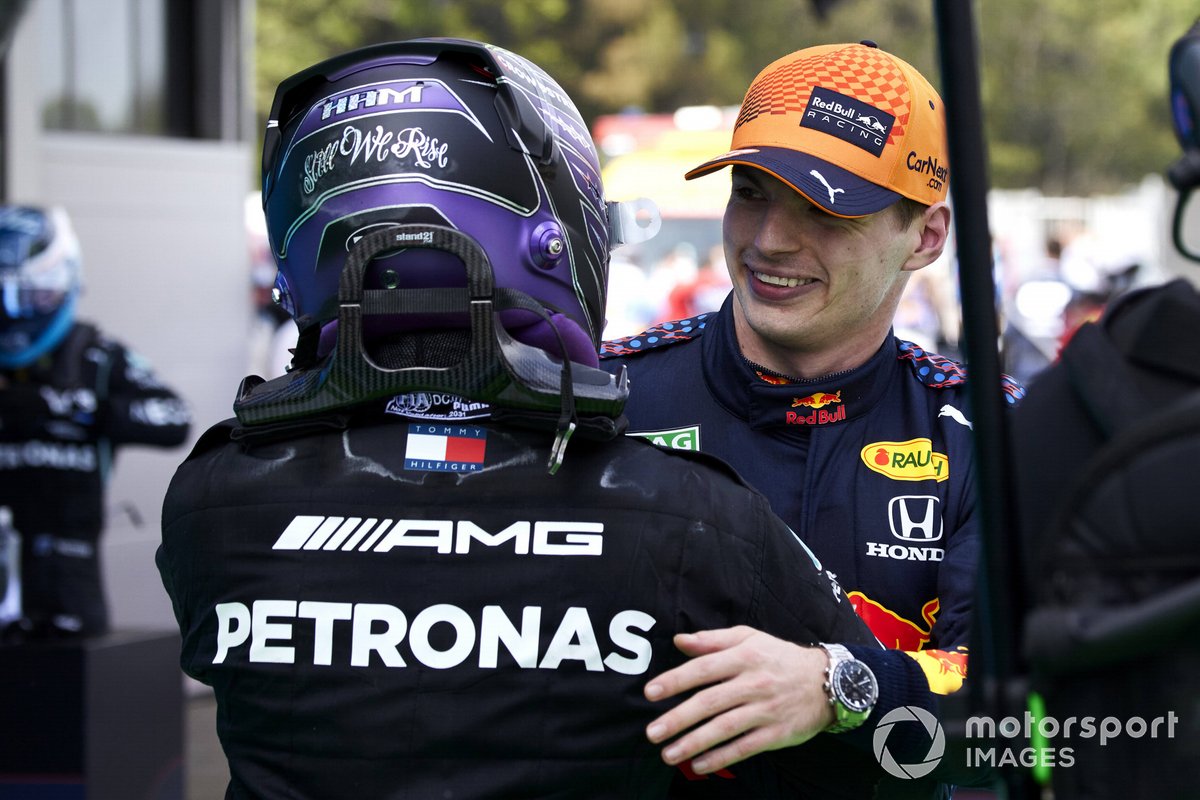 Lewis Hamilton, Mercedes, 1st position, and Max Verstappen, Red Bull Racing, 2nd position, congratulate each other in Parc Ferme