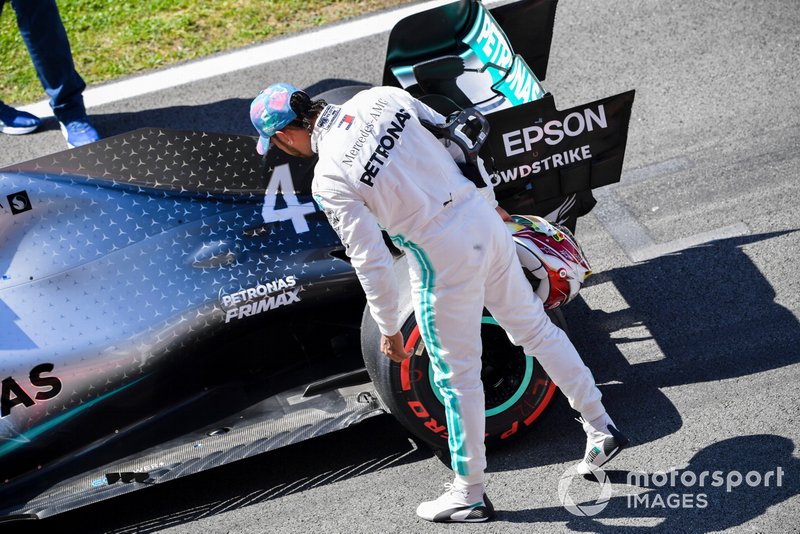 Lewis Hamilton, Mercedes AMG F1 W10, inspects his car after Qualifying second on the grid