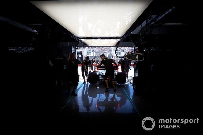 Lewis Hamilton, Mercedes AMG F1 W10, is returned to the garage
