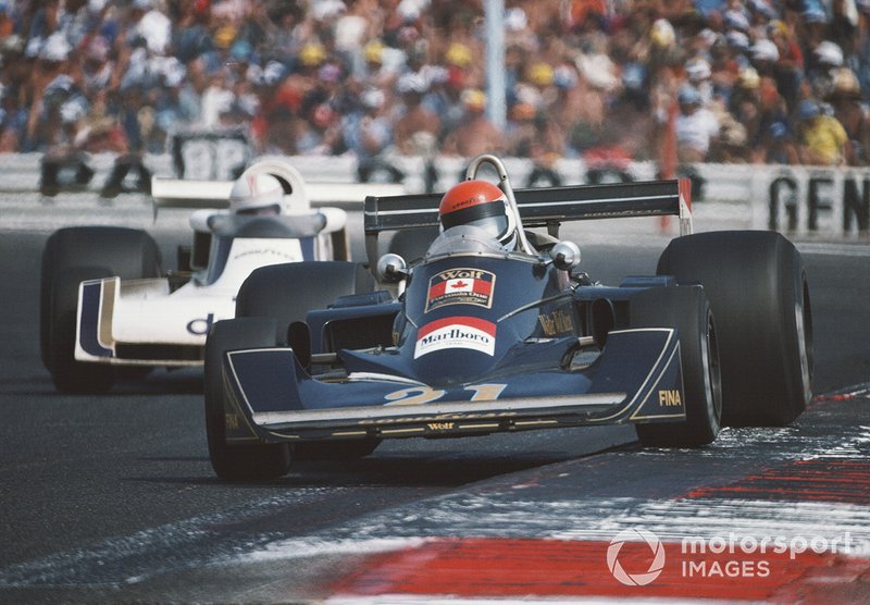 Michel Leclere, Wolf-Williams FW05 Ford, leads Alan Jones, Surtees TS19 Ford