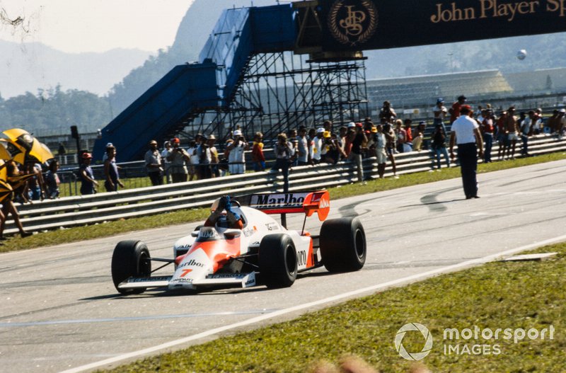 Alain Prost, McLaren MP4-2 TAG, celebrates victory