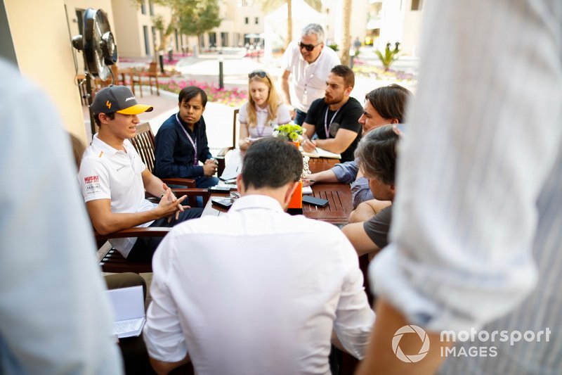 Lando Norris, McLaren, talks to the media