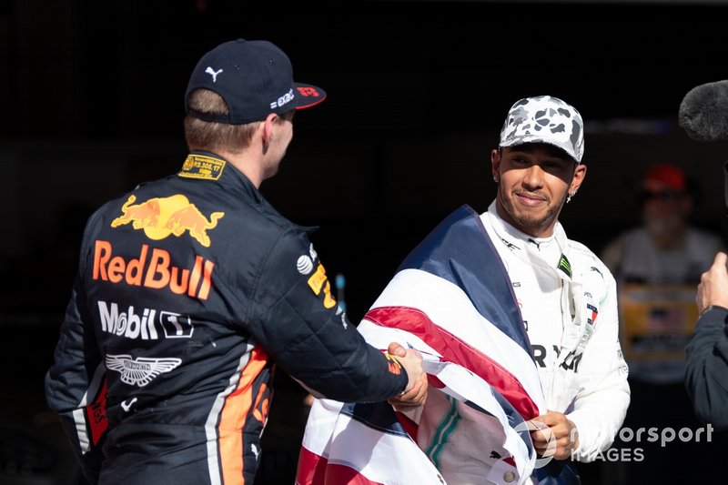 Max Verstappen, Red Bull Racing, 3rd position, congratulates Lewis Hamilton, Mercedes AMG F1, 2nd position, on securing his sixth world drivers championship title