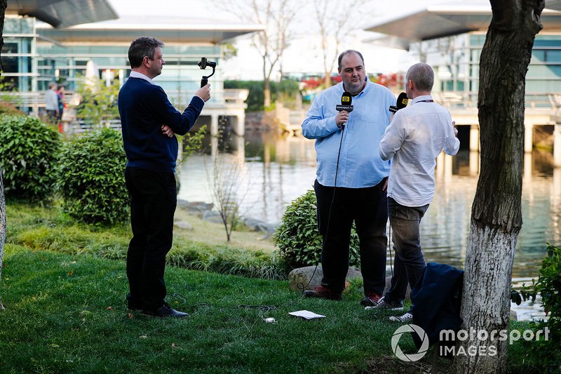 Motorsport Network employees James Roberts, Edd Straw and Stuart Codling make a recording for Motorsport TV