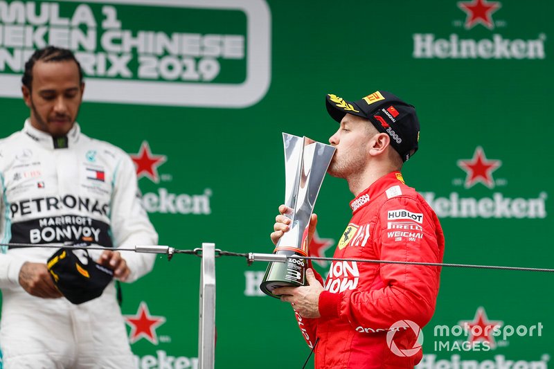 Sebastian Vettel, Ferrari, 3rd position, with his trophy