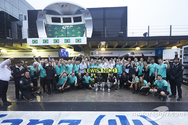 (L to R): Race winner Lewis Hamilton, Mercedes AMG F1 and second place team mate Nico Rosberg, Merce