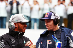 (L to R): Lewis Hamilton, Mercedes AMG F1 with Daniil Kvyat, Scuderia Toro Rosso on the drivers parade