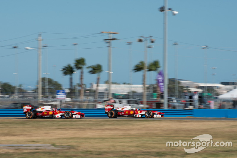 Sebastian Vettel, Ferrari F60; Kimi Raikkonen, Ferrari F60