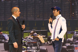 Lance Stroll visits the F1 Racing stand