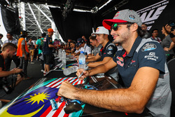 Carlos Sainz Jr., Scuderia Toro Rosso signs autographs for the fans
