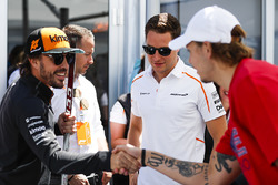 Fernando Alonso, McLaren, and Stoffel Vandoorne, McLaren, meet players from the Montreal Canadiens N