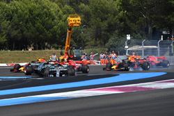 Lewis Hamilton, Mercedes-AMG F1 W09 leads at the start of the race as Sebastian Vettel, Ferrari SF71H hits Valtteri Bottas, Mercedes-AMG F1 W09