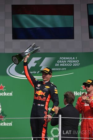 Race winner Max Verstappen, Red Bull Racing celebrates on the podium with the trophy