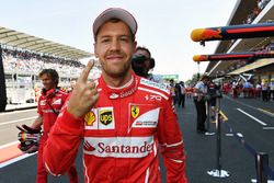 Pole sitter Sebastian Vettel, Ferrari celebrates in parc ferme