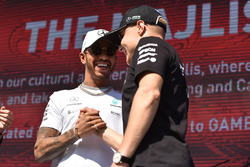Lewis Hamilton, Mercedes AMG F1 and Valtteri Bottas, Mercedes AMG F1 on stage