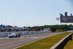 #67 Chip Ganassi Racing Ford GT, GTLM: Ryan Briscoe, Richard Westbrook, Crosses the Start / Finish Line under the Checkered Flag