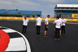 Stoffel Vandoorne, McLaren and Gil De Ferran, McLaren Sporting Director walks the track