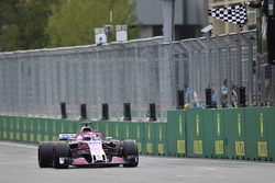 Third place Sergio Perez, Force India VJM11 takes the chequered flag