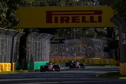 Kevin Magnussen, Haas F1 Team VF-18 Ferrari, leads Romain Grosjean, Haas F1 Team VF-18 Ferrari