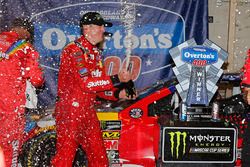 Kyle Busch, Joe Gibbs Racing, Toyota Camry Skittles Red White & Blue celebrates in victory lane