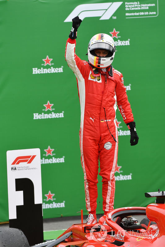 Race winner Sebastian Vettel, Ferrari SF71H celebrates in parc ferme