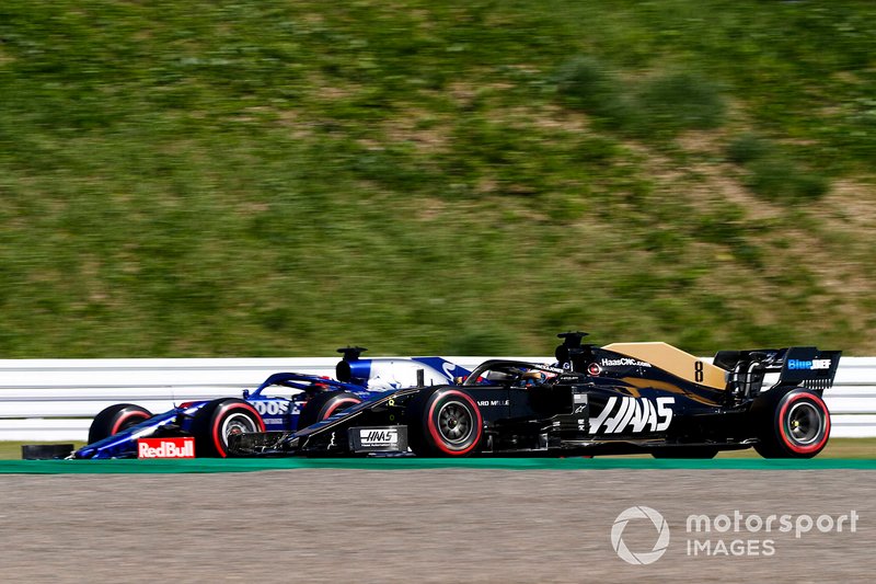 Romain Grosjean, Haas F1 Team VF-19 and Daniil Kvyat, Toro Rosso STR14 