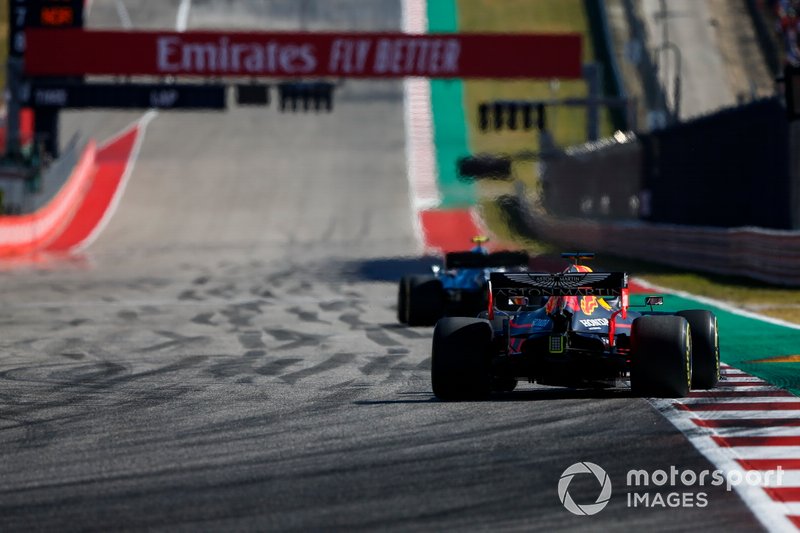 Valtteri Bottas, Mercedes AMG W10, leads Max Verstappen, Red Bull Racing RB15