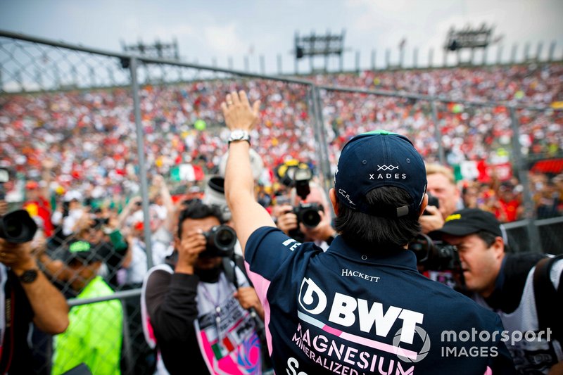 Sergio Perez, Racing Point, waves to his home fans in the drivers parade