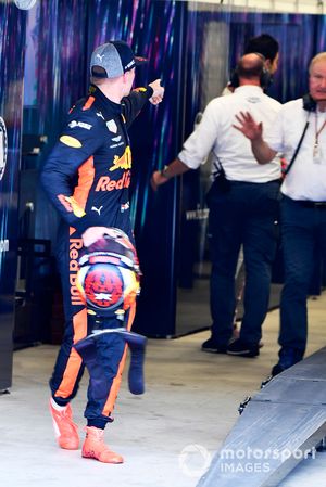 Max Verstappen, Red Bull Racing and Esteban Ocon, Racing Point Force India square up after the race following their on track crash