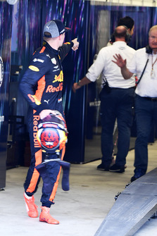 Max Verstappen, Red Bull Racing and Esteban Ocon, Racing Point Force India square up after the race following their on track crash