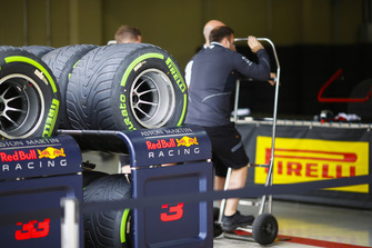 Pirelli tyres in front of the Red Bull pit garage