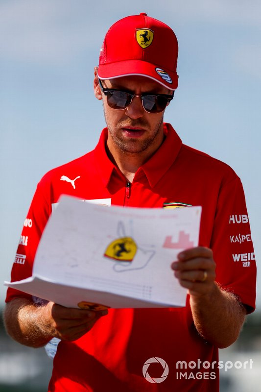 Sebastian Vettel, Ferrari walks the track