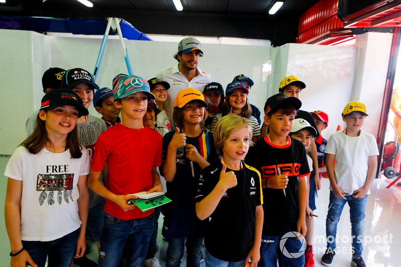 Carlos Sainz Jr., McLaren, meets some young fans