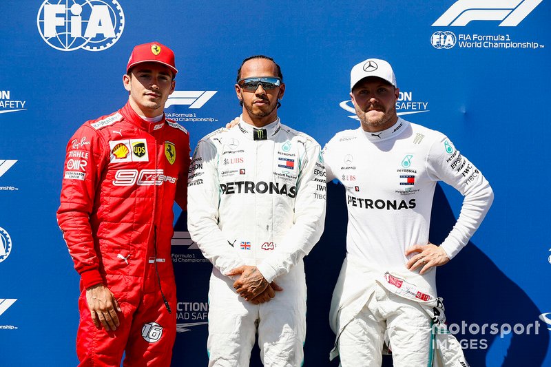 Charles Leclerc, Ferrari, Pole Sitter Lewis Hamilton, Mercedes AMG F1 and Valtteri Bottas, Mercedes AMG F1 celebrate in Parc Ferme