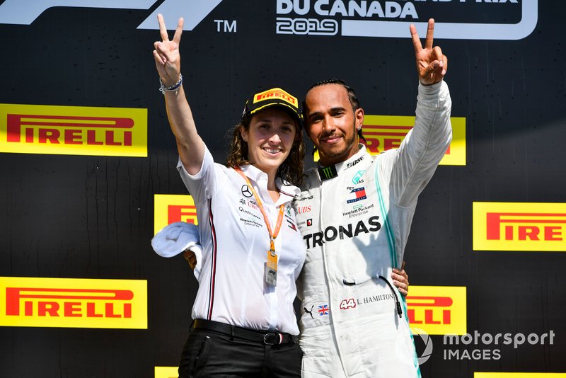 Lewis Hamilton, Mercedes AMG F1 and Mercedes constructors representative celebrate on the podium