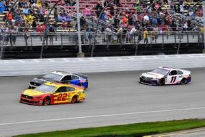 Joey Logano, Team Penske, Ford Mustang Shell Pennzoil, Aric Almirola, Stewart-Haas Racing, Ford Mustang Smithfield / Meijer, and Denny Hamlin, Joe Gibbs Racing, Toyota Camry FedEx Freight on a pace lap
